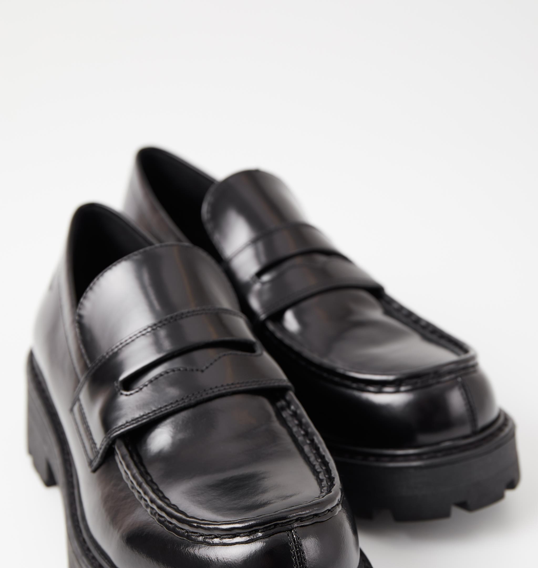 black chunky platform loafers