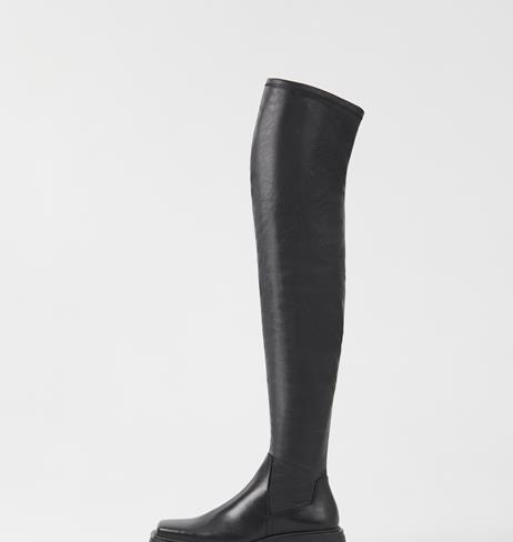 tall over the knee flat boots